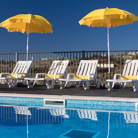 Spend mornings dipping in and out of the communal pool