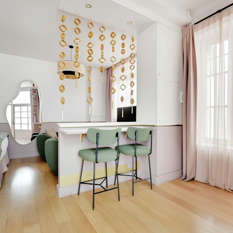 Enjoy a glass of French wine at the bar table