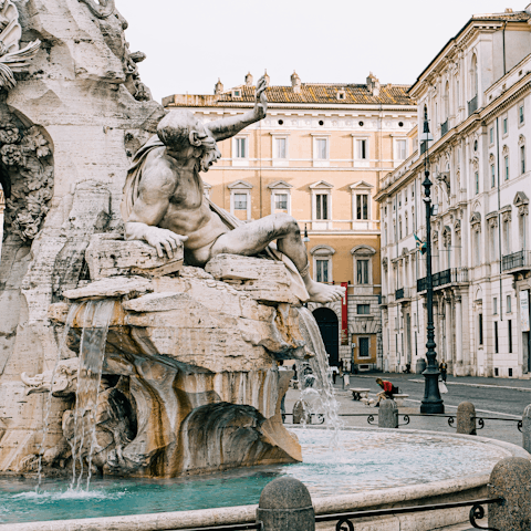 Sip coffee in a cafe in Piazza Navona – it's a short walk away