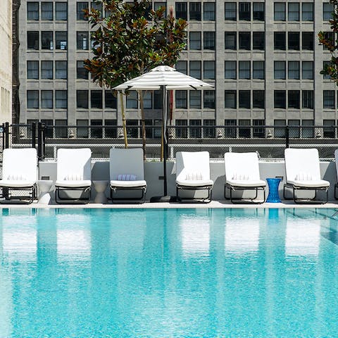 Take a morning swim in the building's rooftop pool