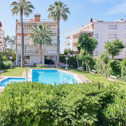 Take a refreshing dip in the shared swimming pool