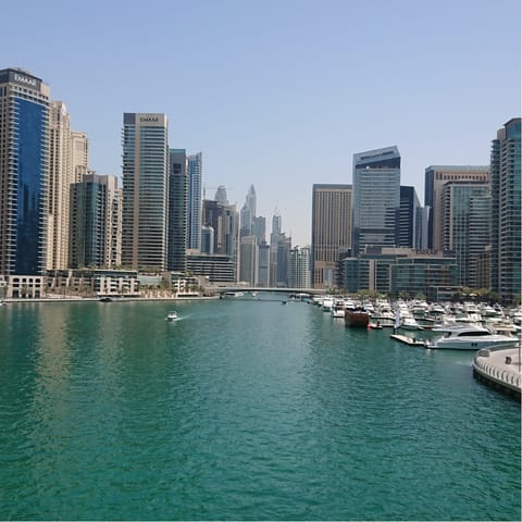Explore bustling Dubai Marina, a ten-minute taxi ride away