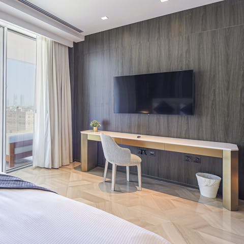 Catch up on work at the bedrooms' desk spaces