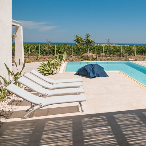 Soak up the Sicilian sun by the pool