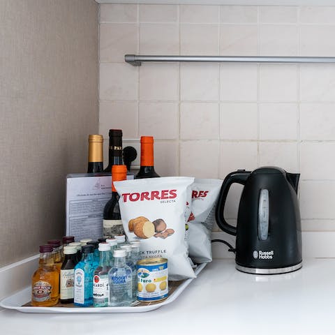 Savour the luxury snacks and drinks on offer from your host