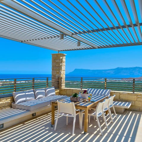 Enjoy fresh Cretan cuisine on the patio accompanied with views of the unspoilt landscape