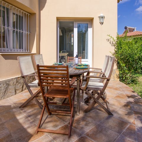 Fire up the barbecue for alfresco meals in the pretty garden