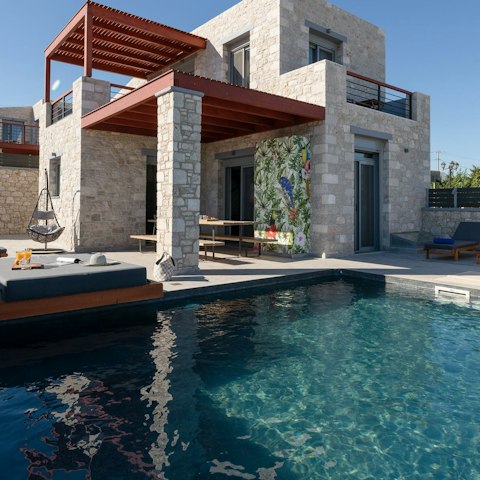 Relax in the Greek sun next to the private pool