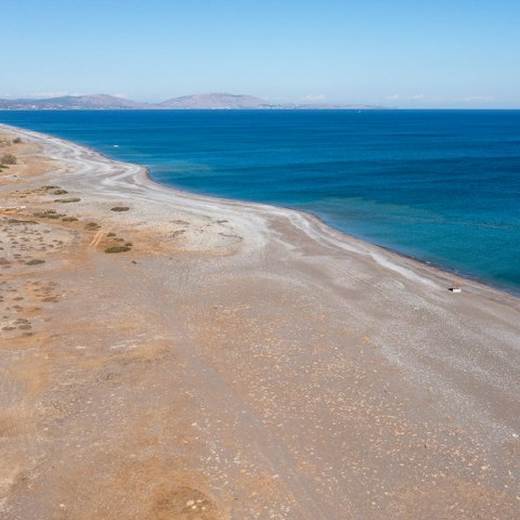 Stay in Rhodes and spend days on Lachania beach, just 100 metres away