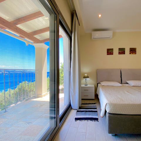 Wake up each morning to wonderful views stretching out over the vivid Ionian Sea