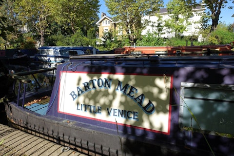 Explore Little Venice's waterways lined with colourful narrowboats, an eighteen-minute walk