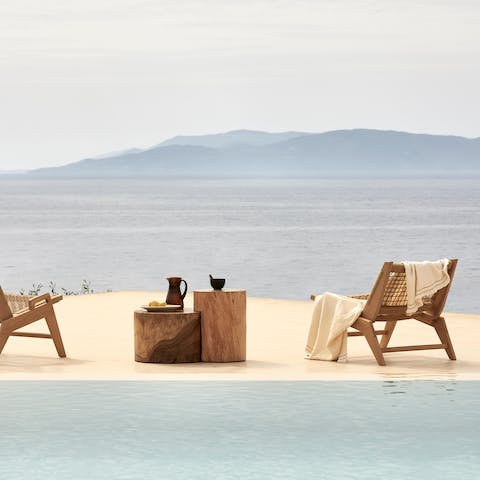 Get front row seats to picturesque sunsets over the Ionian sea, and enjoy a glass of wine with the view