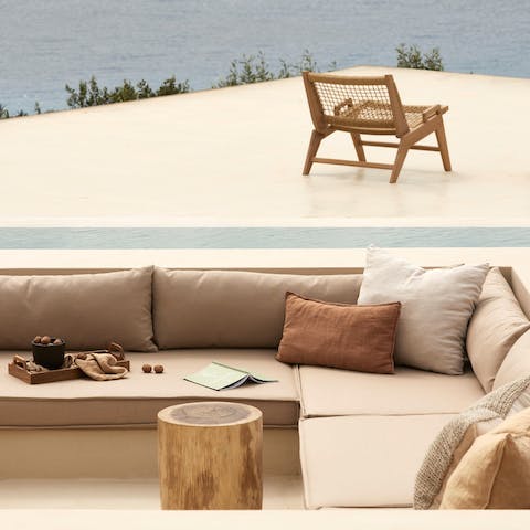 Gather in the luxurious conversation pit integrated with the pool and get the drinks flowing in the evening