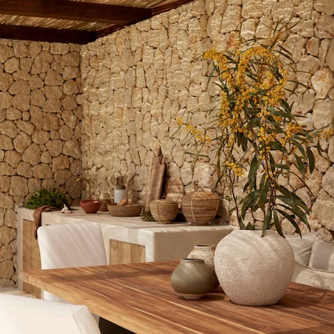 Enjoy sophisticated alfresco dining, and prepare a culinary feast at the outdoor kitchen