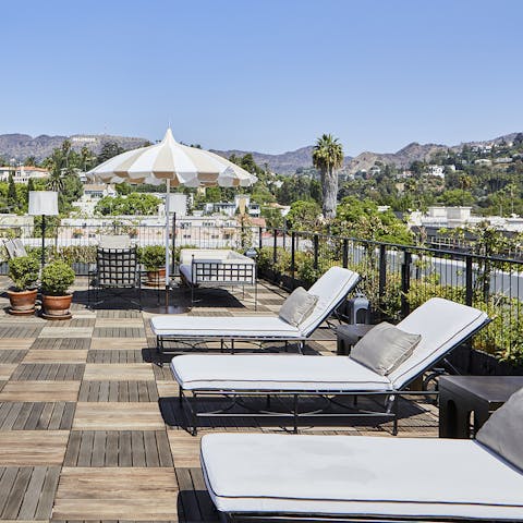 Head up to the shared roof terrace with views across the city