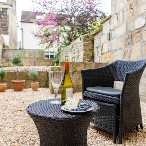 Find the perfect spot for evening drinks on the shared patio