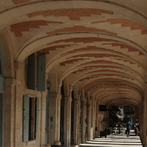 Soak up the history of iconic Place des Vosges, five minutes away