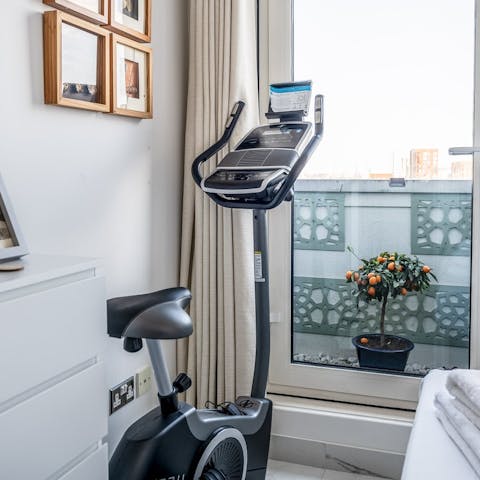 Keep on top of your cardio with the second bedroom's exercise bike