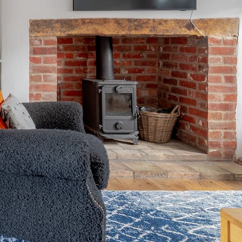 Gather everyone around the wood-burning stove with a hot mug of cocoa