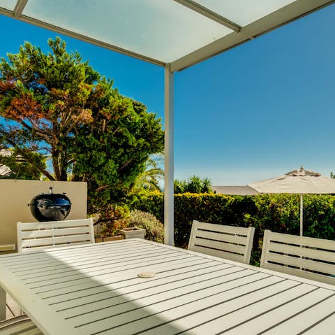 Enjoy lazy meals outside on the covered terrace