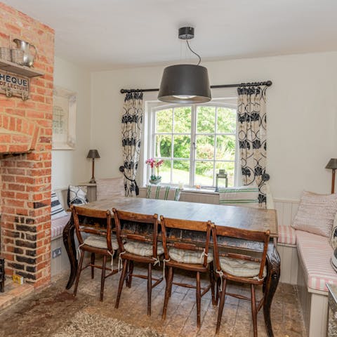 Come together for memorable mealtimes in the charming dining area