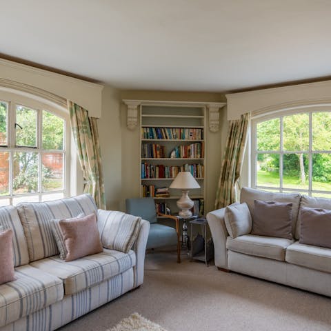 Soak up the picture window views in the cosy lounge