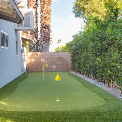 Practise your putting on the mini golfing green