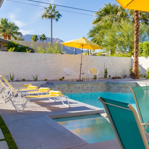 Catch some rays poolside,  an ice cold drink in hand