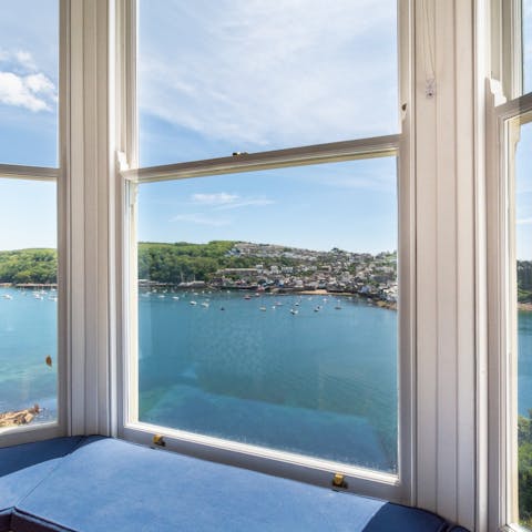 Try not to get distracted by the waterside views when you read a book on the window seat