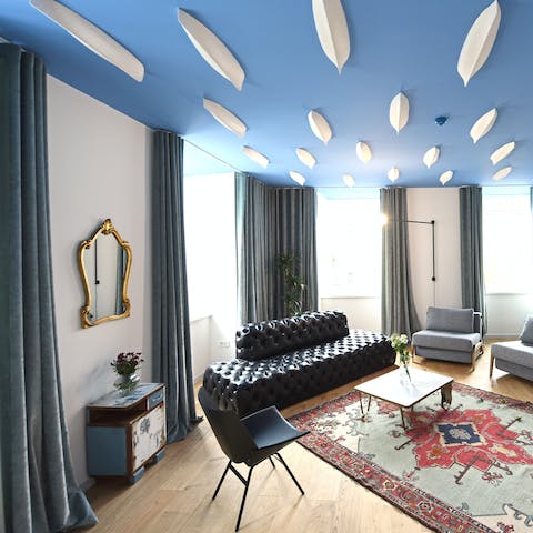 Pour a glass of local wine and relax in the gorgeous living room