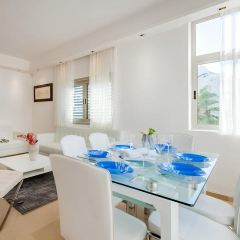 Gather at the dining table after a day of exploration