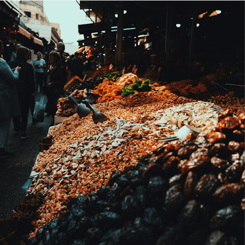 Browse delicacies at Shouk HaCarmel, a five-minute walk away