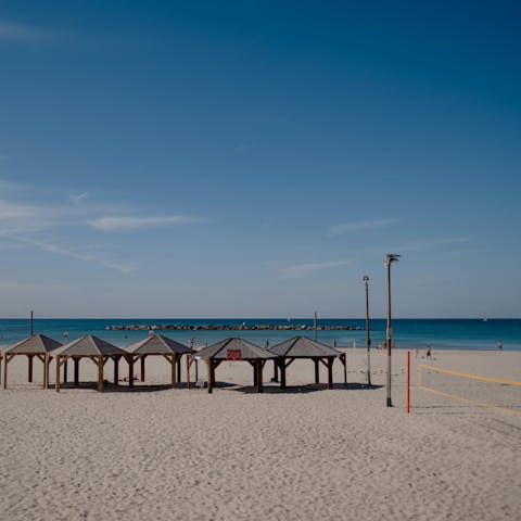 Sink your toes in the sand at nearby Aviv beach
