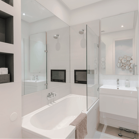 Treat yourself to a long soak in the bathtub and watch a film on the inbuilt television
