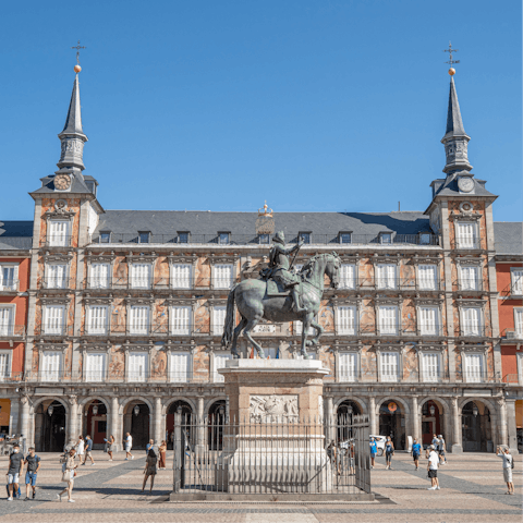 Stretch your legs with a stroll over to the bustling Plaza Mayor