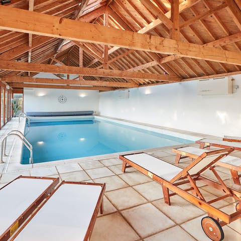 Stretch out by the indoor pool