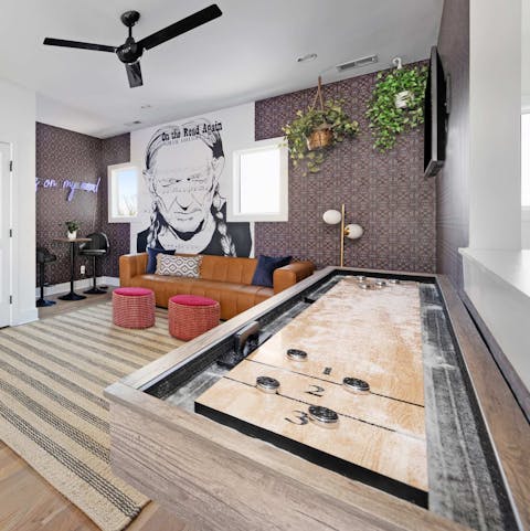 Show off your skills in a game of shuffleboard