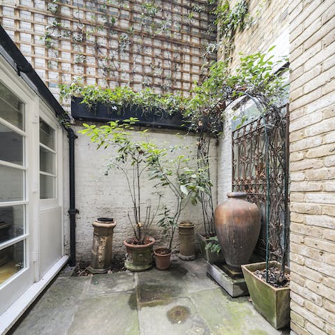 Enjoy some fresh air on the private patio during the summer