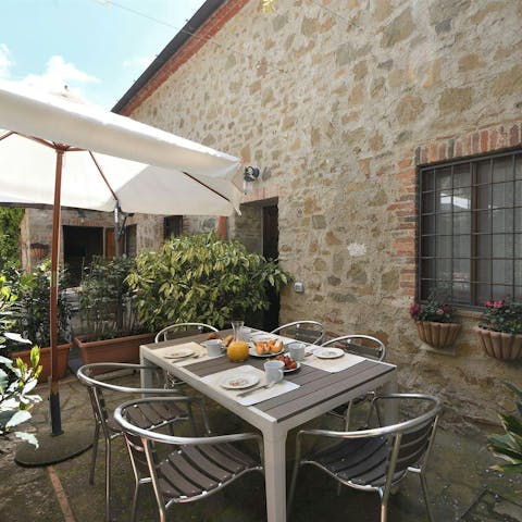 Tuck into an alfresco breakfast on the private terrace