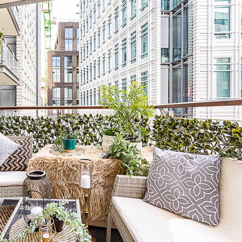 Sip cocktails on the furnished balcony after a day of sightseeing