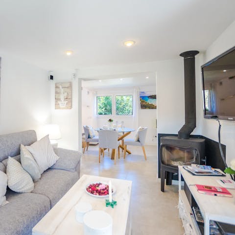 Fire up the log burner for cosy warmth on chillier evenings
