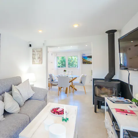 Fire up the log burner for cosy warmth on chillier evenings