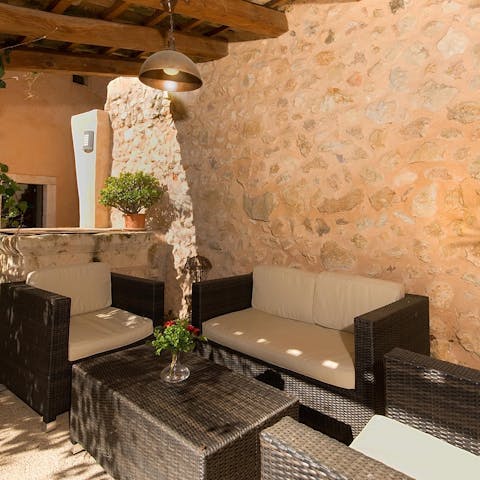 Enjoy a late afternoon aperitif in the shade