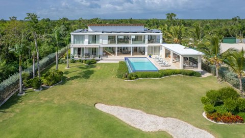 Tee off steps from the pool on a championship course