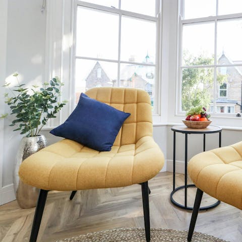 Rest weary feet on the yellow chairs