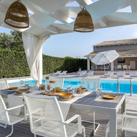 Enjoy alfresco meals under the pergola