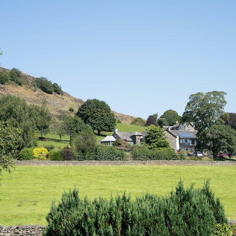 Enjoy views of Kentmere and the River Kent from this charming home
