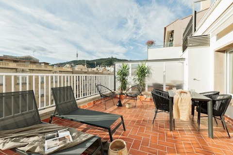 Stretch out on the shared terrace with a glass of sangria in hand