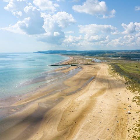 Stay a short drive from the golden dunes of Camber Sands