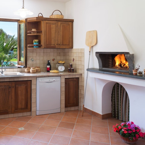 Unleash the dough balls and try your hand at a spot of pizza making